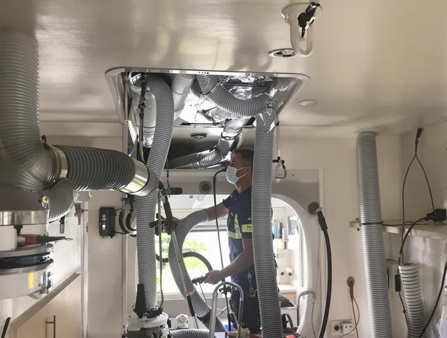 Burrillville Air Duct Cleaning specialist performing precise mobile home duct cleaning in Burrillville