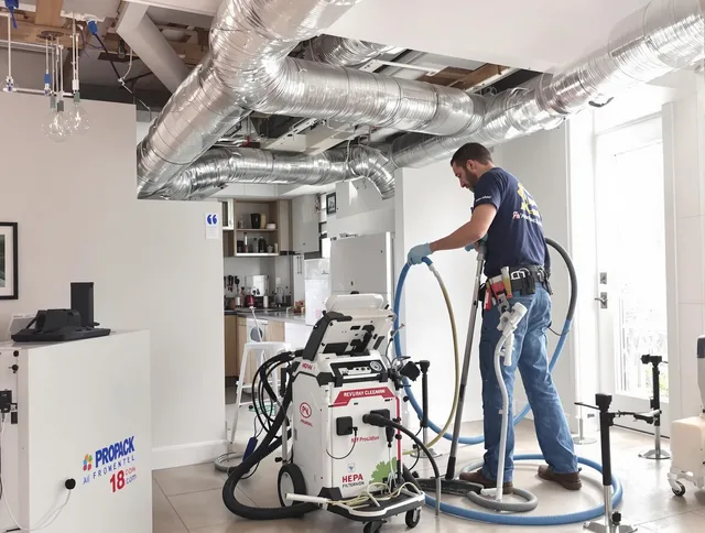 Burrillville Air Duct Cleaning technician performing advanced pure duct cleaning with specialized equipment in Burrillville